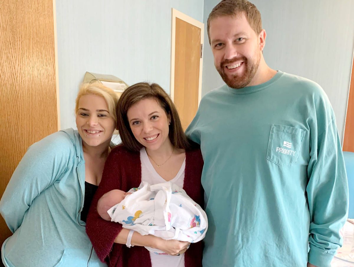 Nataleigh holds one-day-old Judson as she and Zack prepare to take him home from
the hospital.