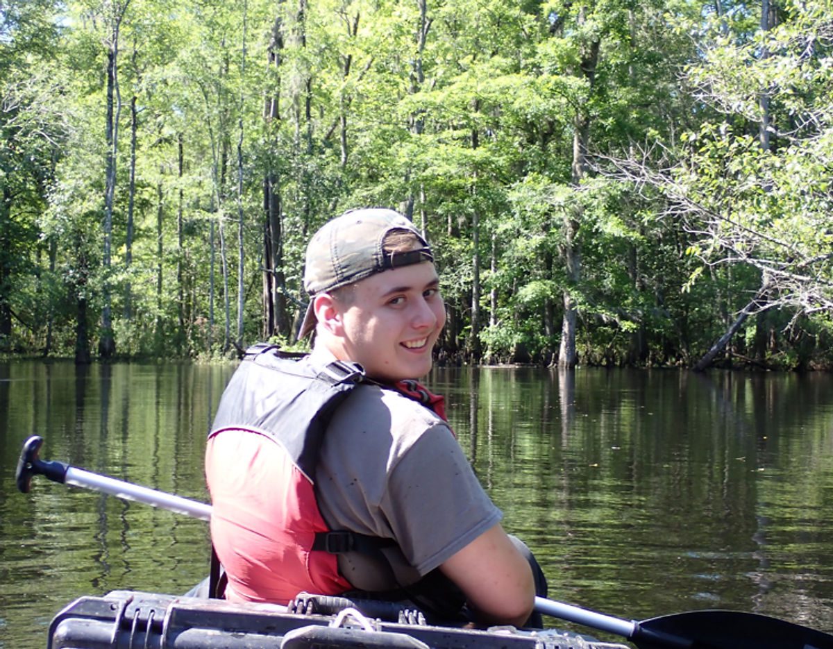 Sam came to Cameron Boys Camp in October 2021. Now seventeen, living at home, and a junior in high school, Sam uses the skills he learned at Camp every day: working three part-time jobs, being on a row team at the North Carolina Rowing Center in Greensboro, and pursuing an online associate degree in finance and accounting.