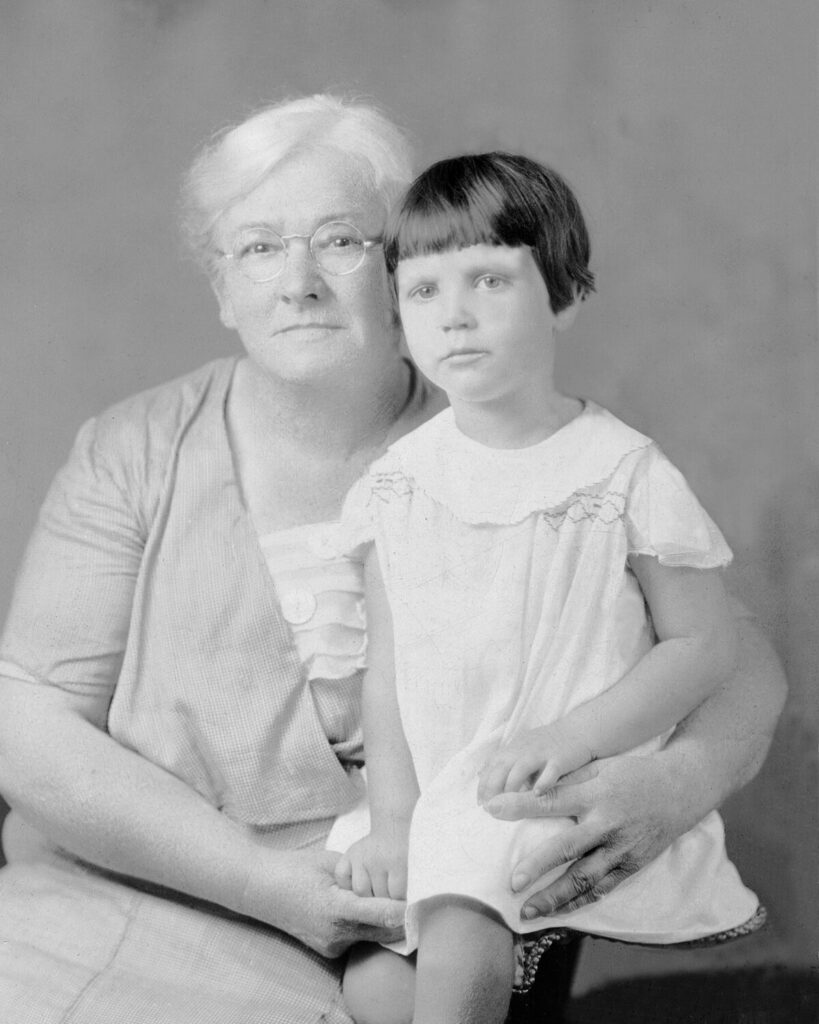 Mary Presson as an adult holding a child