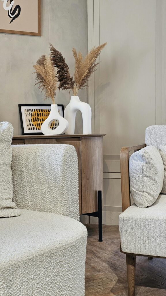 A stylish modern living room with minimalist furniture and decor accents.
