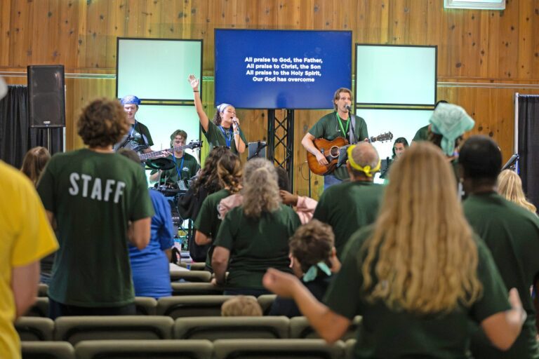 The Scotts Hill praise team leads worship at Mountain Camp.