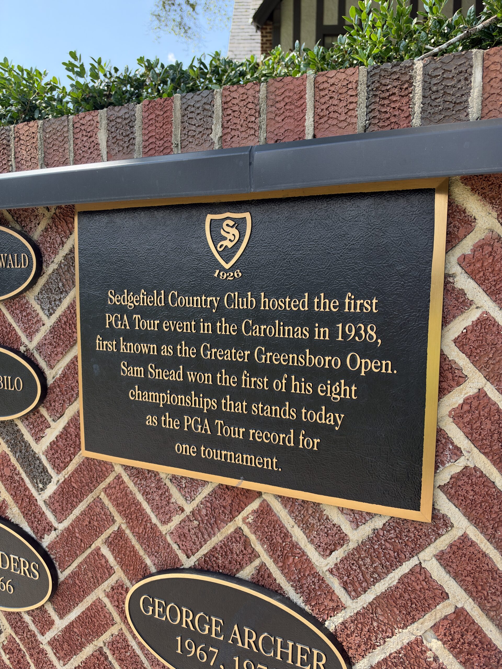 Plaque at Sedgefield Country Club noting it hosted the first Carolinas PGA Tour event in 1938, won by Sam Snead.